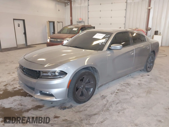 2015 Dodge Charger SXT with VIN 2C3CDXHG0FH851638, listed as a IAAI auction lot 42144753 with 188,929 mi miles and . Bid and sale history available at DreamBid. Image 2.
