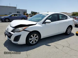 2011 Mazda 3 i Touring with VIN JM1BL1VG3B1449794, listed as a Copart auction lot 59989225 with 113,611 mi miles and Salvage title. Bid and sale history available at DreamBid. Image 1.
