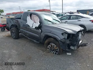 2020 Toyota Tacoma SR z VIN 3TYRX5GN1LT001987, wystawiony jako IAAI lot #42464874 z przebiegiem 34 828 mil mil oraz . Historia ofert i sprzedaży dostępna na DreamBid. Obrazek 1.