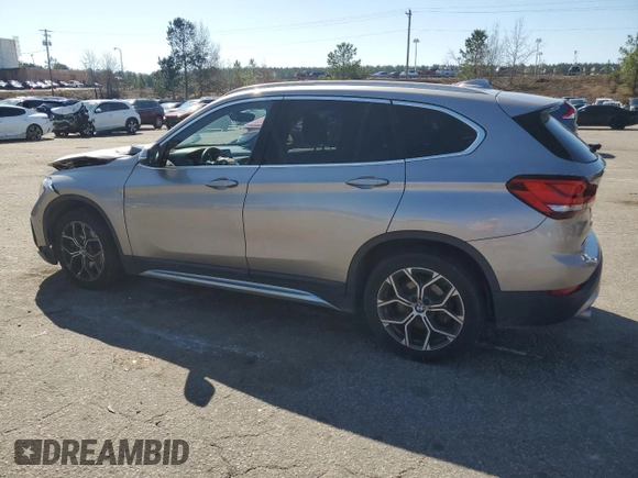 2021 BMW X1 sDrive28i with VIN WBXJG7C0XM5S33884, listed as a Copart auction lot 48413405 with 89,698 mi miles and Salvage Title. Bid and sale history available at DreamBid. Image 2.