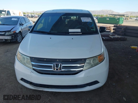 2012 Honda Odyssey EX-L with VIN 5FNRL5H67CB051764, listed as a IAAI auction lot 42493181 with 167,189 mi miles and . Bid and sale history available at DreamBid. Image 6.