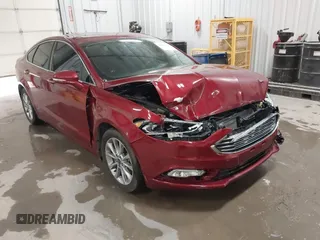 2017 Ford Fusion SE z VIN 3FA6P0HD8HR405800, wystawiony jako IAAI lot #41823918 z przebiegiem 54 034 mil mil oraz . Historia ofert i sprzedaży dostępna na DreamBid. Obrazek 1.