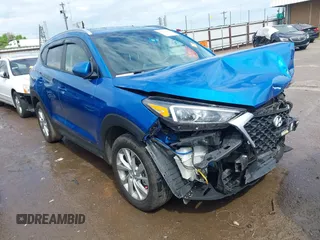 2019 Hyundai Tucson Value z VIN KM8J33A46KU025569, wystawiony jako IAAI lot #42119388 z przebiegiem 57 396 mil mil oraz . Historia ofert i sprzedaży dostępna na DreamBid. Obrazek 1.