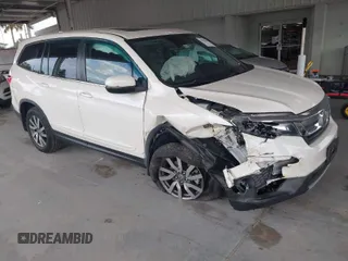 2019 Honda Pilot EX-L with VIN 5FNYF6H57KB011649, listed as a IAAI auction lot 41880951 with 99,504 mi miles. Bid and sale history available at carsss.com. Image 1.