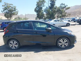 2015 Honda Fit EX-L z VIN 3HGGK5H88FM706513, wystawiony jako IAAI lot #42493772 z przebiegiem 173 129 mil mil oraz . Historia ofert i sprzedaży dostępna na DreamBid. Obrazek 14.