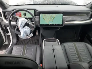 2023 Rivian R1S Adventure z VIN 7PDSGBBA2PN026420, wystawiony jako Copart lot #55331045 z przebiegiem 29 938 mil mil oraz Szkoda całkowita • Salvage title. Historia ofert i sprzedaży dostępna na DreamBid. Obrazek 8.