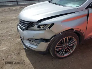 2015 Lincoln MKC with VIN 5LMTJ2AH8FUJ23341, listed as a IAAI auction lot 41828159 with 103,562 mi miles. Bid and sale history available at carsss.com. Image 12.