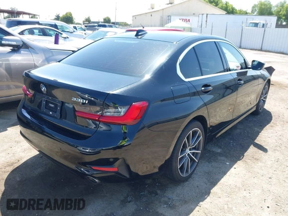 2019 BMW 3 Series 330i with VIN WBA5R1C50KAJ98579, listed as a IAAI auction lot 42359728 with 41,173 mi miles and . Bid and sale history available at DreamBid. Image 4.