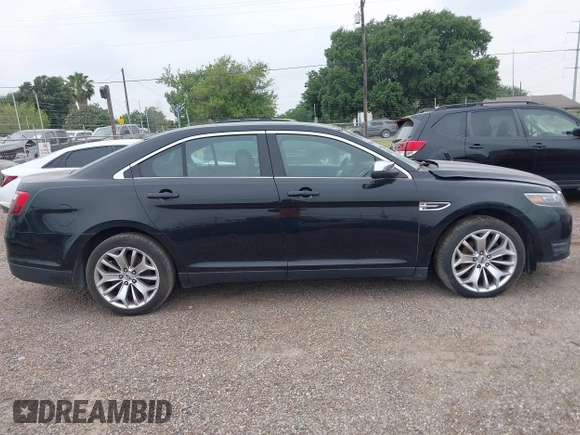 2017 Ford Taurus Limited z VIN 1FAHP2F80HG104374, wystawiony jako IAAI lot #42283261 z przebiegiem 169 378 mil mil oraz . Historia ofert i sprzedaży dostępna na DreamBid. Obrazek 14.