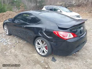 2010 Hyundai Genesis Coupe Track w/Nav with VIN KMHHU6KHXAU004544, listed as a IAAI auction lot 41882264 with 147,420 mi miles. Bid and sale history available at carsss.com. Image 3.