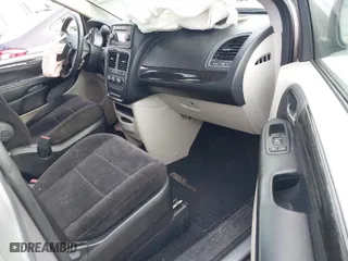 2014 Dodge Grand Caravan SE with VIN 2C4RDGBG7ER131079, listed as a IAAI auction lot 41614495 with 122,925 mi miles. Bid and sale history available at carsss.com. Image 5.