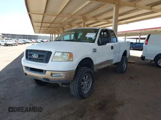 2005 Ford F-150 STX with VIN 1FTRX14W55FA03147, listed as a IAAI auction lot 42455231 with 210,999 mi miles and . Bid and sale history available at DreamBid. Image 2.