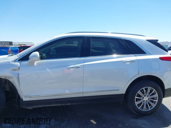 2017 Cadillac XT5 Luxury AWD z VIN 1GYKNDRS8HZ120863, wystawiony jako IAAI lot #42101279 z przebiegiem 100 535 mil mil oraz . Historia ofert i sprzedaży dostępna na DreamBid. Obrazek 15.