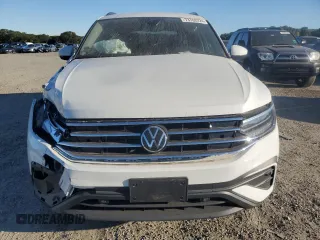 2023 Volkswagen Tiguan S с VIN 3VVFB7AX5PM093275, выставлен на аукционе Copart как лот 73763224 с пробегом 11 084 миль миль и Списание • Salvage title. История ставок и продаж доступна на DreamBid. Изображение 5.