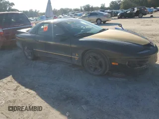 2000 Pontiac Firebird with VIN 2G2FS22K6Y2128059, listed as a Copart auction lot 84488194 with 0 mi miles and Clean Title. Bid and sale history available at carsss.com. Image 4.