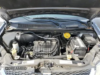 2014 Dodge Grand Caravan SE 30th Anniversary with VIN 2C4RDGBG6ER361826, listed as a Copart auction lot 55062375 with 135,990 mi miles and Clean Title. Bid and sale history available at DreamBid. Image 12.