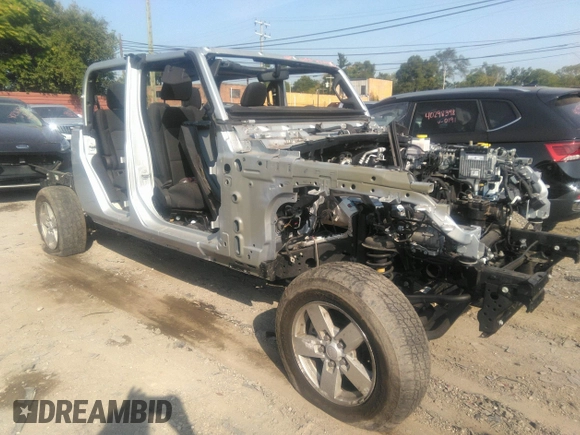 2022 Jeep Gladiator Willys with VIN 1C6HJTAG0NL131004, listed as a IAAI auction lot 40307060 with Not provided miles and . Bid and sale history available at DreamBid. Image 1.