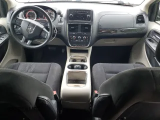 2015 Dodge Grand Caravan SXT with VIN 2C4RDGCG7FR536049, listed as a Copart auction lot 55963115 with 141,228 mi miles and Clean Title. Bid and sale history available at DreamBid. Image 8.