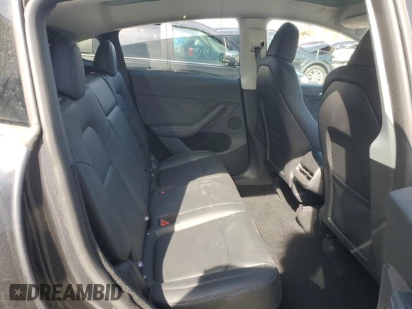 2024 Tesla Model Y Long Range with VIN 7SAYGDEE7RA307013, listed as a Copart auction lot 54767595 with 12,953 mi miles and Salvage Title. Bid and sale history available at DreamBid. Image 11.