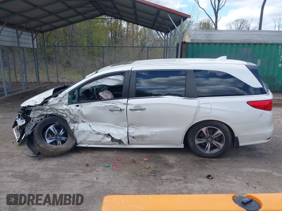 2018 Honda Odyssey Touring with VIN 5FNRL6H81JB023530, listed as a IAAI auction lot 42040124 with 109,128 mi miles and . Bid and sale history available at DreamBid. Image 14.