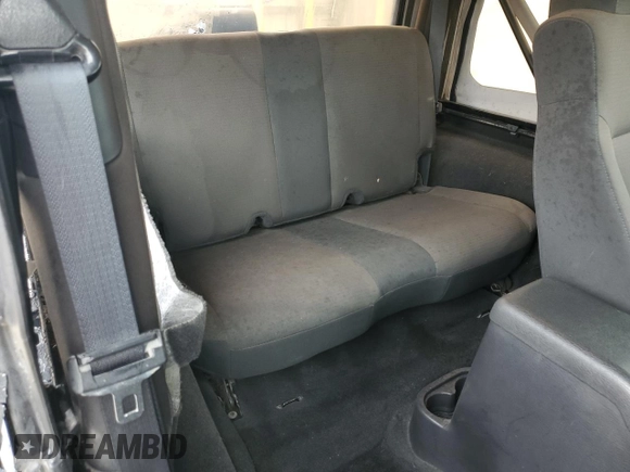 2006 Jeep Wrangler X with VIN 1J4FA39SX6P719070, listed as a Copart auction lot 55598455 with 110,741 mi miles and Salvage title. Bid and sale history available at DreamBid. Image 11.