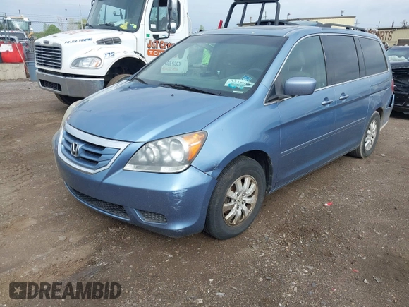 2009 Honda Odyssey EX-L with VIN 5FNRL386X9B048306, listed as a IAAI auction lot 42159882 with 189,623 mi miles. Bid and sale history available at carsss.com. Image 2.