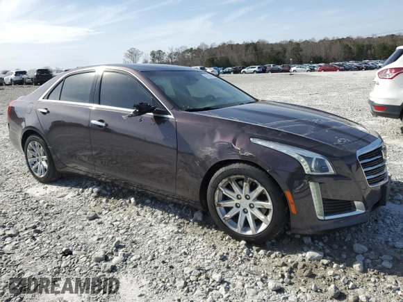 2015 Cadillac CTS Luxury RWD with VIN 1G6AR5SX8F0105026, listed as a Copart auction lot 47985555 with 105,745 mi miles and Salvage Title. Bid and sale history available at DreamBid. Image 4.