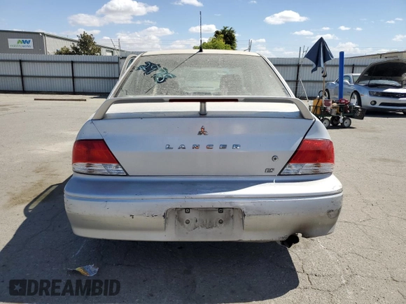 2003 Mitsubishi Lancer ES with VIN JA3AJ26E73U062975, listed as a Copart auction lot 71619374 with 242,550 mi miles and Salvage Title. Bid and sale history available at carsss.com. Image 6.