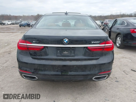2017 BMW 7 Series 740i xDrive z VIN WBA7E4C55HGU99165, wystawiony jako IAAI lot #42073278 z przebiegiem 47 506 mil mil oraz . Historia ofert i sprzedaży dostępna na DreamBid. Obrazek 16.