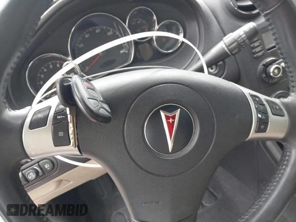 2007 Pontiac G6 GT with VIN 1G2ZH351674151077, listed as a IAAI auction lot 41946215 with 187,449 mi miles and . Bid and sale history available at DreamBid. Image 11.