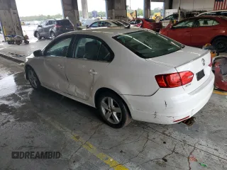 2013 Volkswagen Jetta TDI w/Premium with VIN 3VWLL7AJ0DM351270, listed as a Copart auction lot 71204324 with 91,075 mi miles and Salvage title. Bid and sale history available at DreamBid. Image 2.