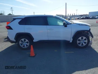 2023 Toyota RAV4 LE z VIN 2T3H1RFV1PW248254, wystawiony jako IAAI lot #41687924 z przebiegiem 25 003 mil mil oraz . Historia ofert i sprzedaży dostępna na DreamBid. Obrazek 13.