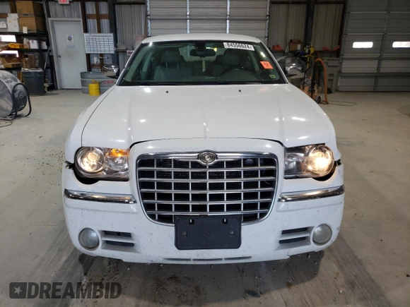 2010 Chrysler 300 with VIN 2C3CA6CT8AH329985, listed as a Copart auction lot 84556624 with 165,348 mi miles and Salvage Title. Bid and sale history available at carsss.com. Image 5.