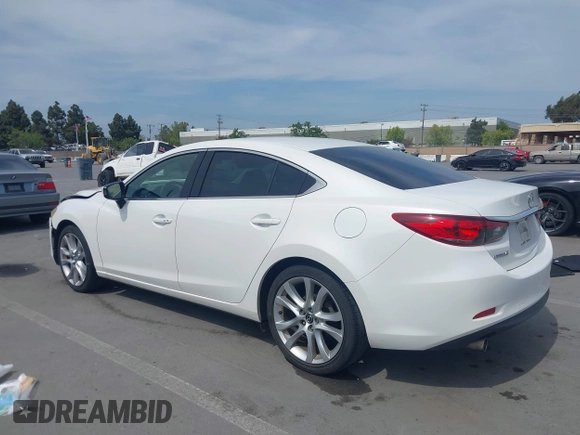 2016 Mazda Mazda6 i Touring with VIN JM1GJ1V57G1429887, listed as a IAAI auction lot 42029170 with 140,519 mi miles. Bid and sale history available at carsss.com. Image 3.
