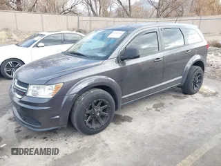 2014 Dodge Journey American Value Pkg with VIN 3C4PDCAB5ET235427, listed as a IAAI auction lot 41056216 with 164,740 mi miles. Bid and sale history available at carsss.com. Image 2.