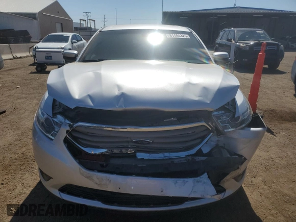 2018 Ford Taurus SEL with VIN 1FAHP2E87JG115802, listed as a Copart auction lot 61454325 with 71,738 mi miles and Salvage title. Bid and sale history available at DreamBid. Image 5.