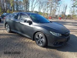 2016 Honda Civic Sedan EX-L with VIN 2HGFC1F77GH659079, listed as a IAAI auction lot 41768528 with 69,349 mi miles. Bid and sale history available at carsss.com. Image 1.