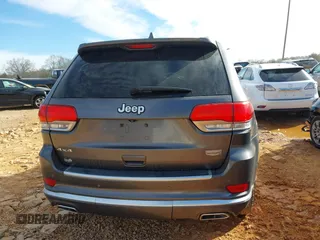2015 Jeep Grand Cherokee Summit with VIN 1C4RJFJG8FC679185, listed as a IAAI auction lot 41653531 with 158,186 mi miles and . Bid and sale history available at DreamBid. Image 17.