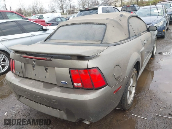 2002 Ford Mustang GT Deluxe z VIN 1FAFP45X32F169177, wystawiony jako IAAI lot #41880690 z przebiegiem 107 284 mil mil oraz . Historia ofert i sprzedaży dostępna na DreamBid. Obrazek 4.