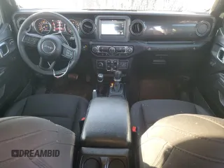 2023 Jeep Wrangler Sport S z VIN 1C4HJXDN6PW674398, wystawiony jako Copart lot #45695875 z przebiegiem 12 964 mil mil oraz Czysty tytuł • Clean title. Historia ofert i sprzedaży dostępna na DreamBid. Obrazek 8.