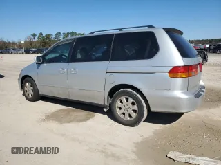 2003 Honda Odyssey EX-L with VIN 5FNRL18903B145567, listed as a Copart auction lot 47925695 with 294,627 mi miles and Salvage Title. Bid and sale history available at DreamBid. Image 2.