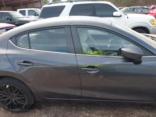 2014 Mazda 3 S Grand Touring with VIN JM1BM1W35E1212740, listed as a IAAI auction lot 41632056 with 158,872 mi miles and . Bid and sale history available at DreamBid. Image 13.