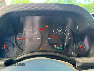 2008 Jeep Wrangler Unlimited X с VIN 1J4GA39158L578432, выставлен на аукционе Copart как лот 65827245 с пробегом 92 335 миль миль и Чистый • Clean title. История ставок и продаж доступна на DreamBid. Изображение 8.