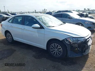 2021 Volkswagen Jetta S z VIN 3VWC57BU9MM034560, wystawiony jako IAAI lot #42239655 z przebiegiem 75 424 mil mil oraz . Historia ofert i sprzedaży dostępna na DreamBid. Obrazek 1.