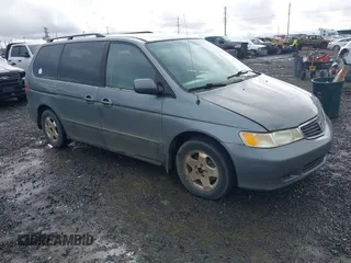 2000 Honda Odyssey EX z VIN 2HKRL1869YH009047, wystawiony jako IAAI lot #41603779 z przebiegiem 281 110 mil mil oraz . Historia ofert i sprzedaży dostępna na DreamBid. Obrazek 1.