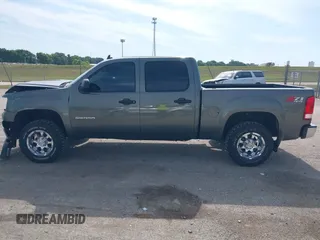 2011 GMC Sierra 1500 SLE with VIN 3GTP2VE36BG290512, listed as a IAAI auction lot 42706204 with 104,590 mi miles and . Bid and sale history available at DreamBid. Image 14.