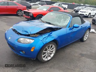 2006 Mazda MX-5 Miata Touring z VIN JM1NC25FX60102209, wystawiony jako IAAI lot #41940771 z przebiegiem 165 003 mil mil oraz . Historia ofert i sprzedaży dostępna na DreamBid. Obrazek 17.