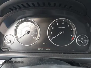 2015 BMW 5 Series 528i with VIN WBA5A5C52FD514549, listed as a IAAI auction lot 41812177 with 107,819 mi miles. Bid and sale history available at carsss.com. Image 7.