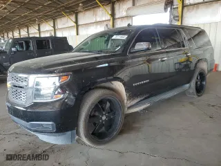 2015 Chevrolet Suburban LS with VIN 1GNSCHECXFR161422, listed as a Copart auction lot 70711664 with 213,167 mi miles and Salvage Title. Bid and sale history available at carsss.com. Image 1.