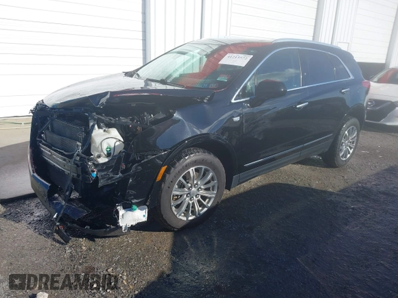 2017 Cadillac XT5 Luxury FWD with VIN 1GYKNBRS5HZ164209, listed as a IAAI auction lot 41213572 with 144,039 mi miles. Bid and sale history available at carsss.com. Image 21.